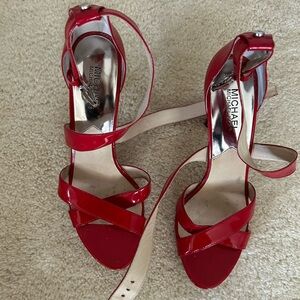 Michael Kors Red Patent Leather platform strappy pumps
Gently used
9 1/2 M